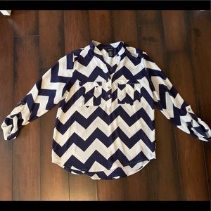 Chevron print blouse in navy blue and white.